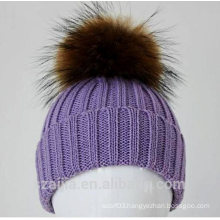 Ladies fashion knitted beanie with fake fur pom